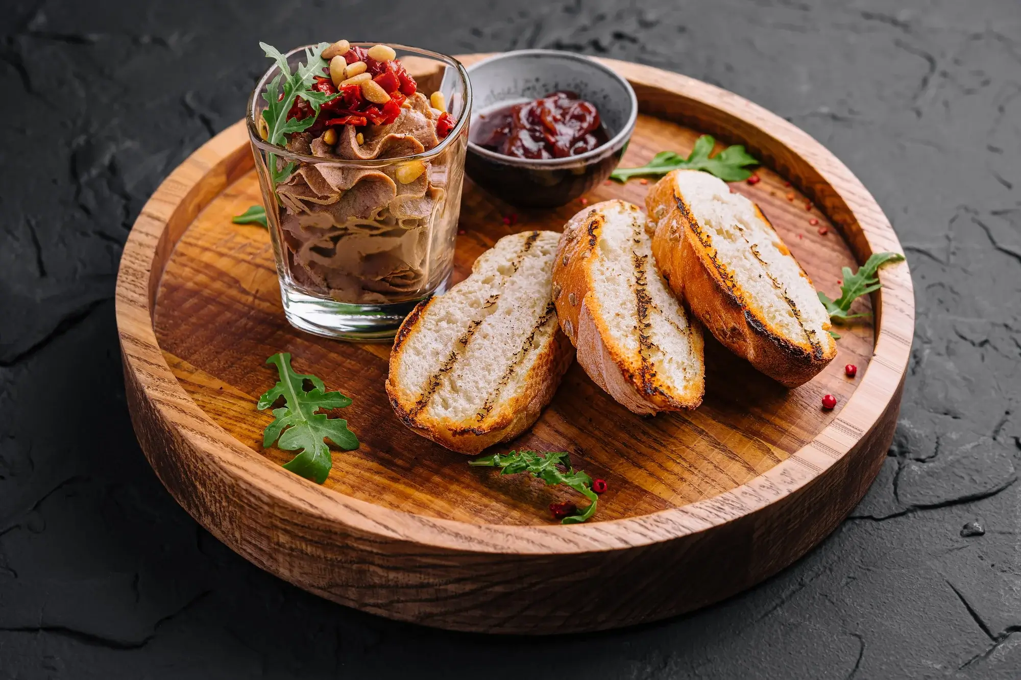 Smooth liver pâté in air fryer served in a ramekin with toast