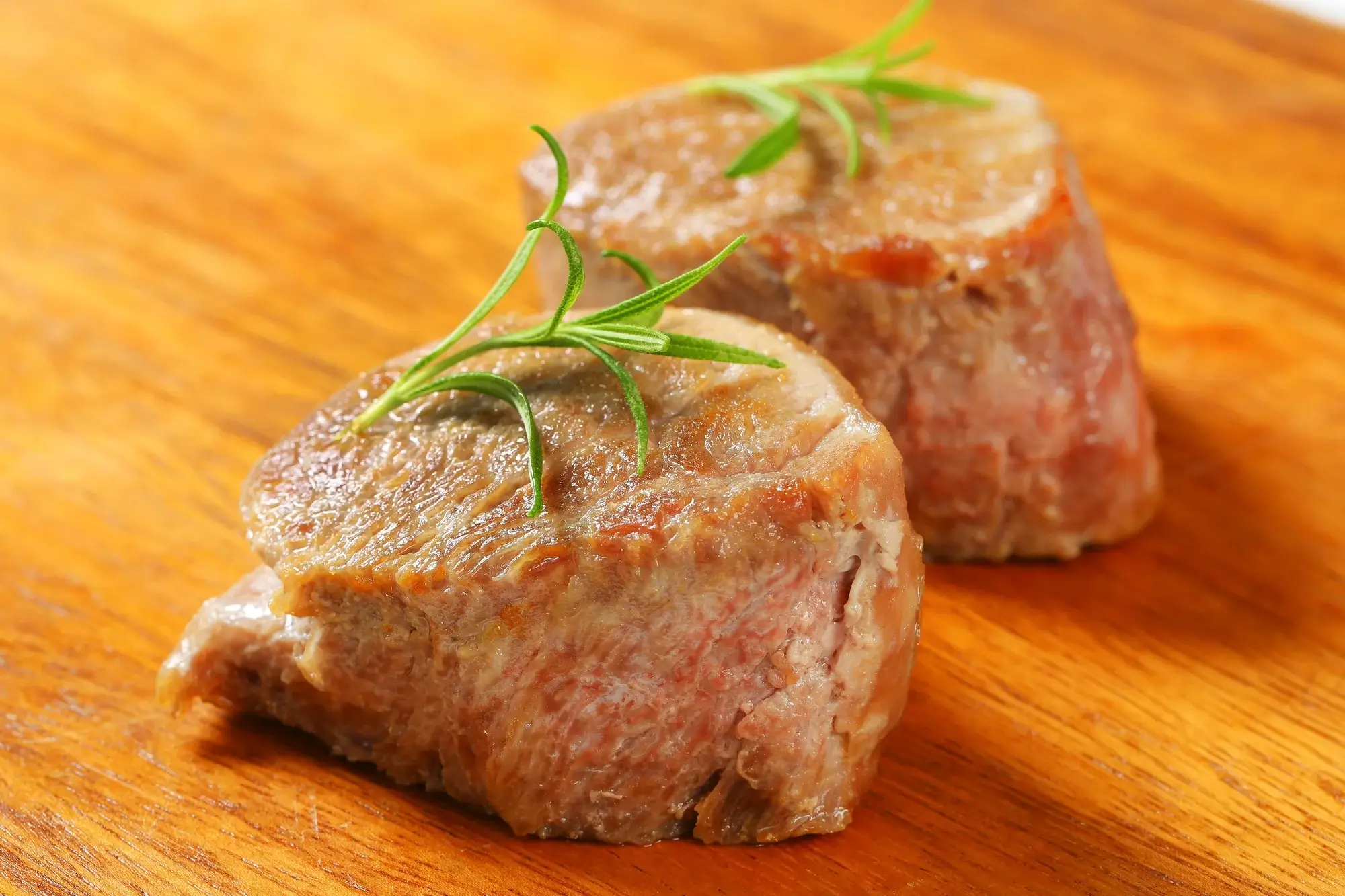 Pork medallions in air fryer served with vegetables