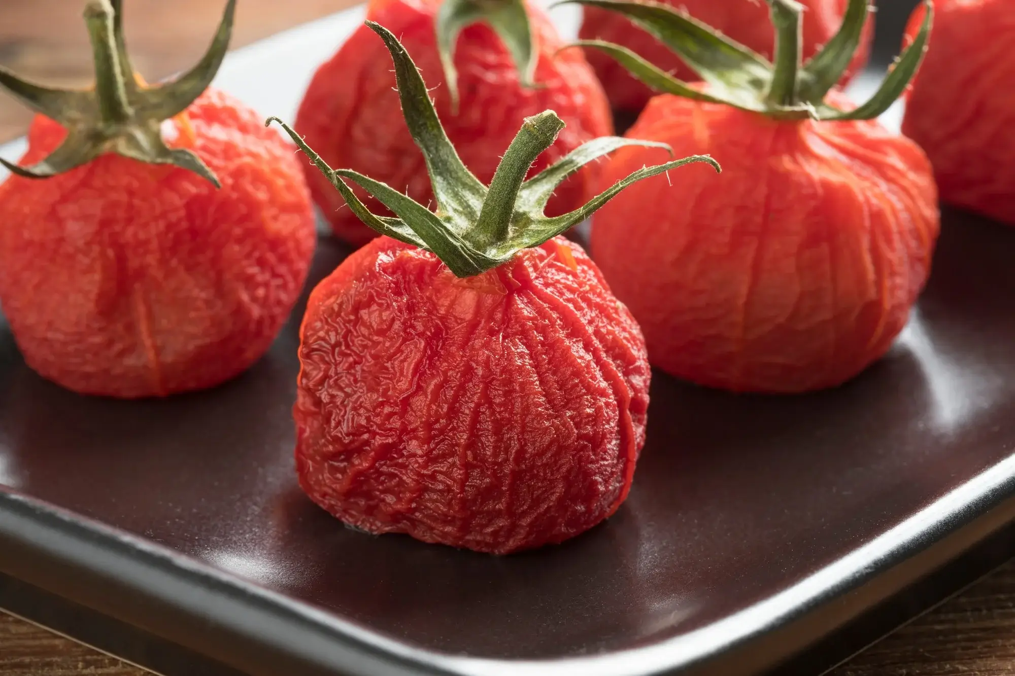 Grilled tomatoes in air fryer with crispy edges
